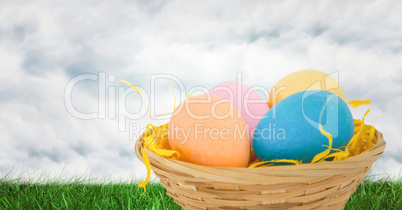 Easter eggs in front of cloudy sky