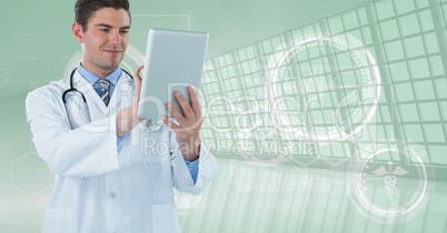 Happy doctor with his tablet Happy doctor with his tablet