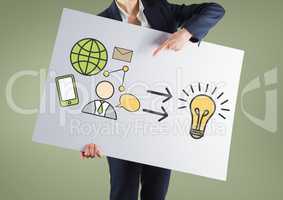 Businesswoman holding card with idea bulb and business graphics drawings