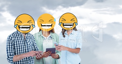 Digital composite of friends with laughing emojis using smart phones and digital tablet