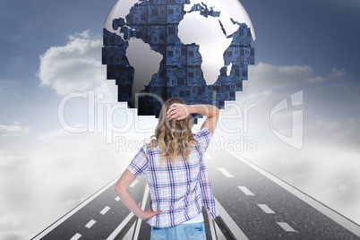 Digital composite image of confused woman looking at globe