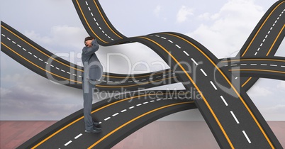 Male professional standing on wavy roads