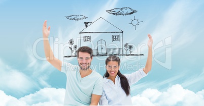 Happy couple with dream house in sky