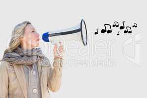 Woman talking in megaphone with musical notes coming out