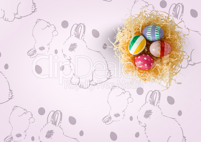 Easter eggs in nest on top of pattern