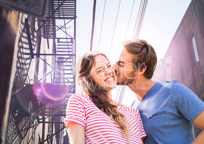 Couple. Men giving a kiss for woman in the city