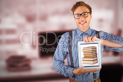 Composite image of geeky businessman showing his tablet pc