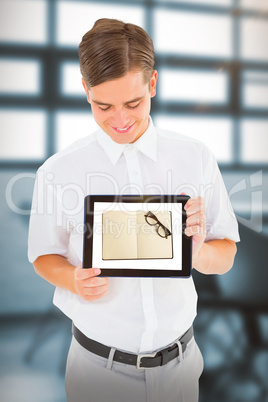 Composite image of geeky businessman showing his tablet pc