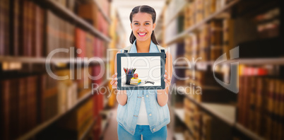 Composite image of pretty student showing her tablet pc