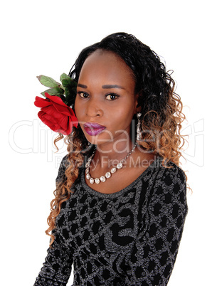 Pretty woman with red rose.