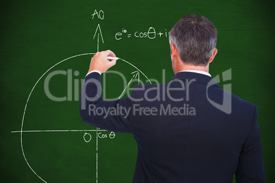 Composite image of rear view of businessman writing with chalk