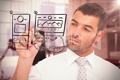 Composite image of concentrated businessman writing with marker