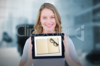 Composite image of portrait of happy woman showing digital tablet