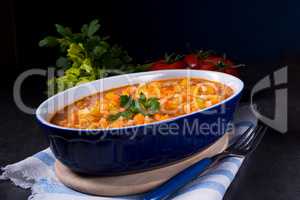 fish with vegetables in tomato sauce