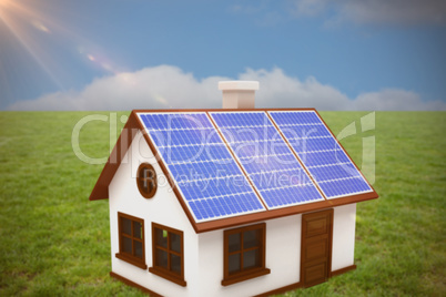 Composite image of 3d vector image of house with solar panels