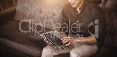 Businessperson using laptop