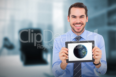 Composite image of smiling businessman showing his digital tablet