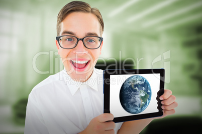Composite image of geeky businessman showing his tablet pc