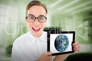 Composite image of geeky businessman showing his tablet pc