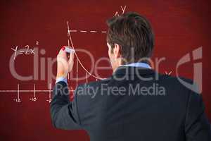 Composite image of rear view of businessman standing and writing