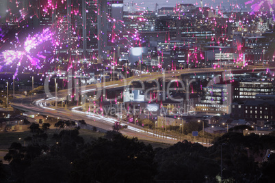 Composite image of colourful fireworks exploding on black background