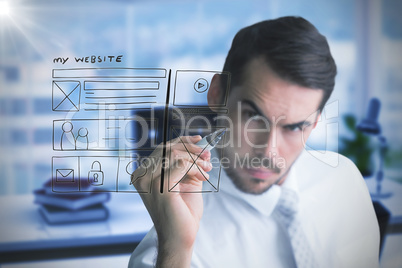 Composite image of focused businessman writing with marker