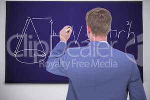 Composite image of businessman writing on a white background