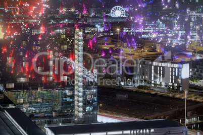 Composite image of colourful fireworks exploding on black background