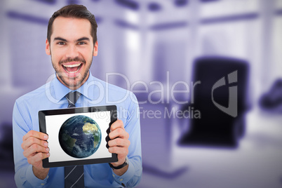 Composite image of happy businessman showing his tablet pc