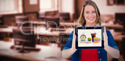 Composite image of smiling woman holding tablet pc