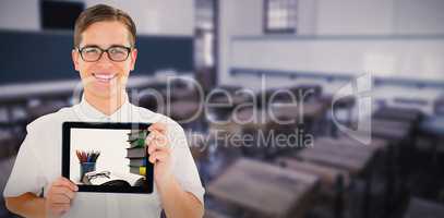 Composite image of geeky businessman showing his tablet pc