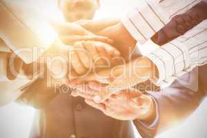 Close-up of business coworkers stacking hands