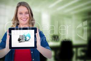 Composite image of smiling woman holding tablet pc