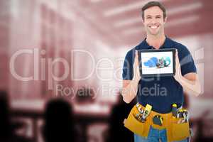Composite image of happy carpenter holding digital tablet