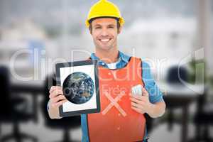 Composite image of carpenter holding digital tablet and mobile phone