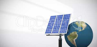 Composite image of digitally generated image of 3d globe and solar panel