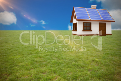 Composite image of 3d illustration of house with solar panels