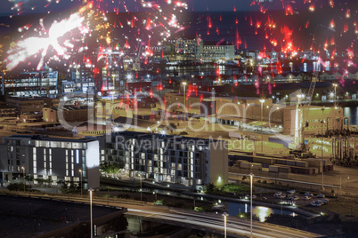 Composite image of colourful fireworks exploding on black background