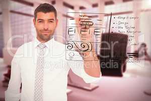 Composite image of confident male executive writing with marker