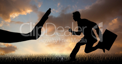 Composite image of running businessman