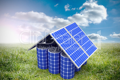 Composite image of 3d image of house model made from solar panels and cells