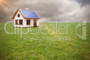 Composite image of digitally composite image of 3d house with solar panels