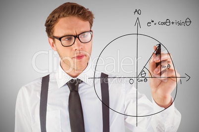 Composite image of geeky businessman writing with marker