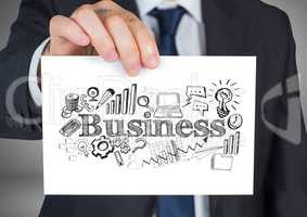 Businessman holding card with business graphics drawings