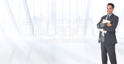 happy business men with his notebook on white blurred background