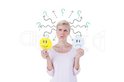 Confused woman with sad and happy emojis