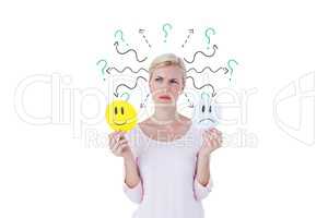 Confused woman with sad and happy emojis