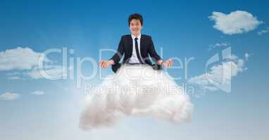 Digital composite image of businessman on cloud