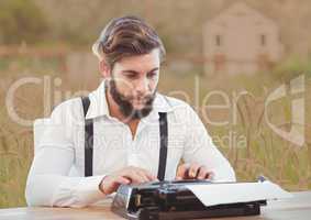 Man on typewriter with soft country background