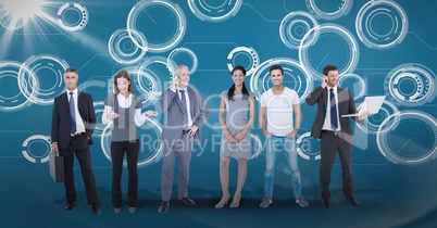 Digitally generated image of business people standing against tech graphics
